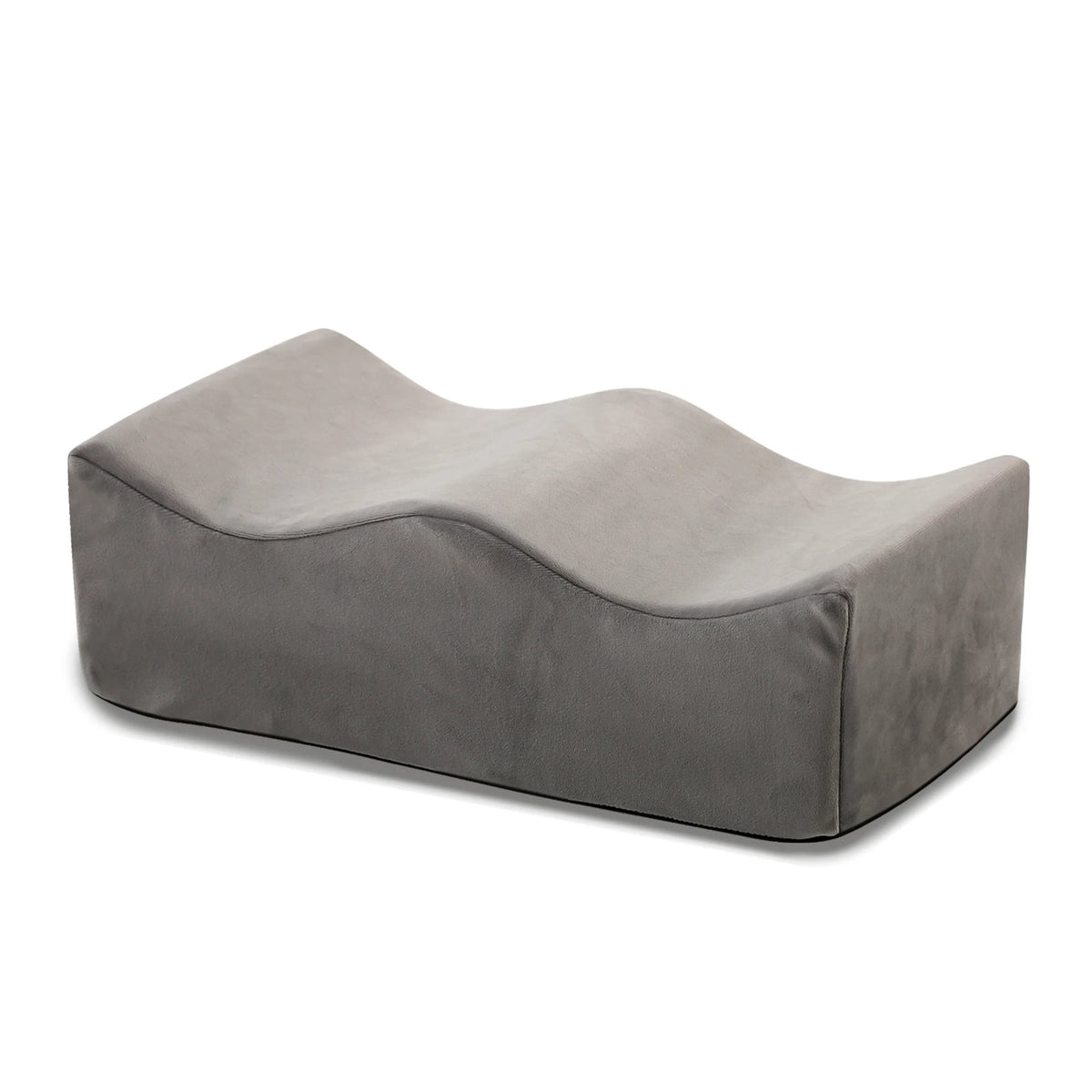Coussin repose-jambes gris à profil en vagues